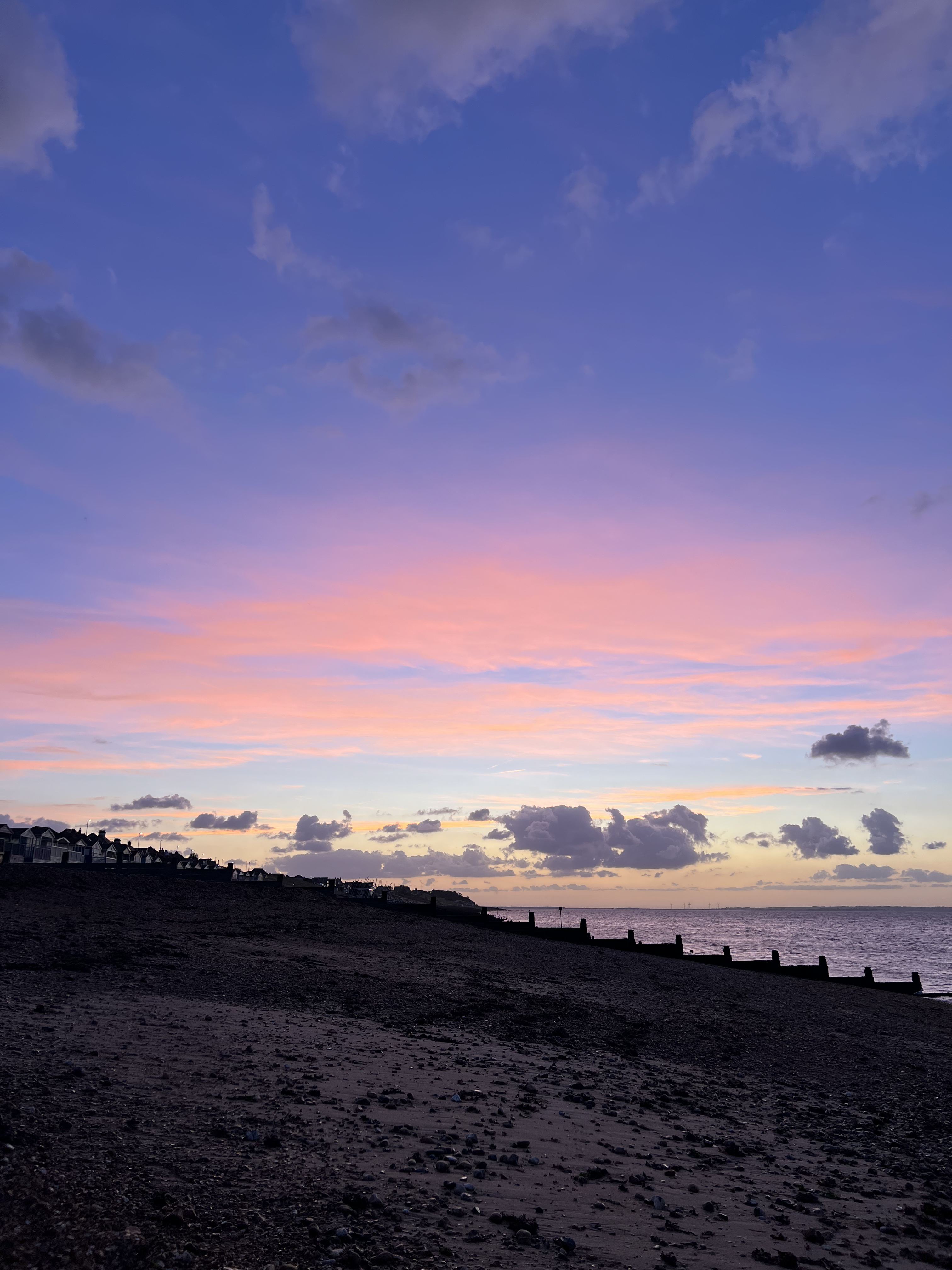 Twilight over a beach groin