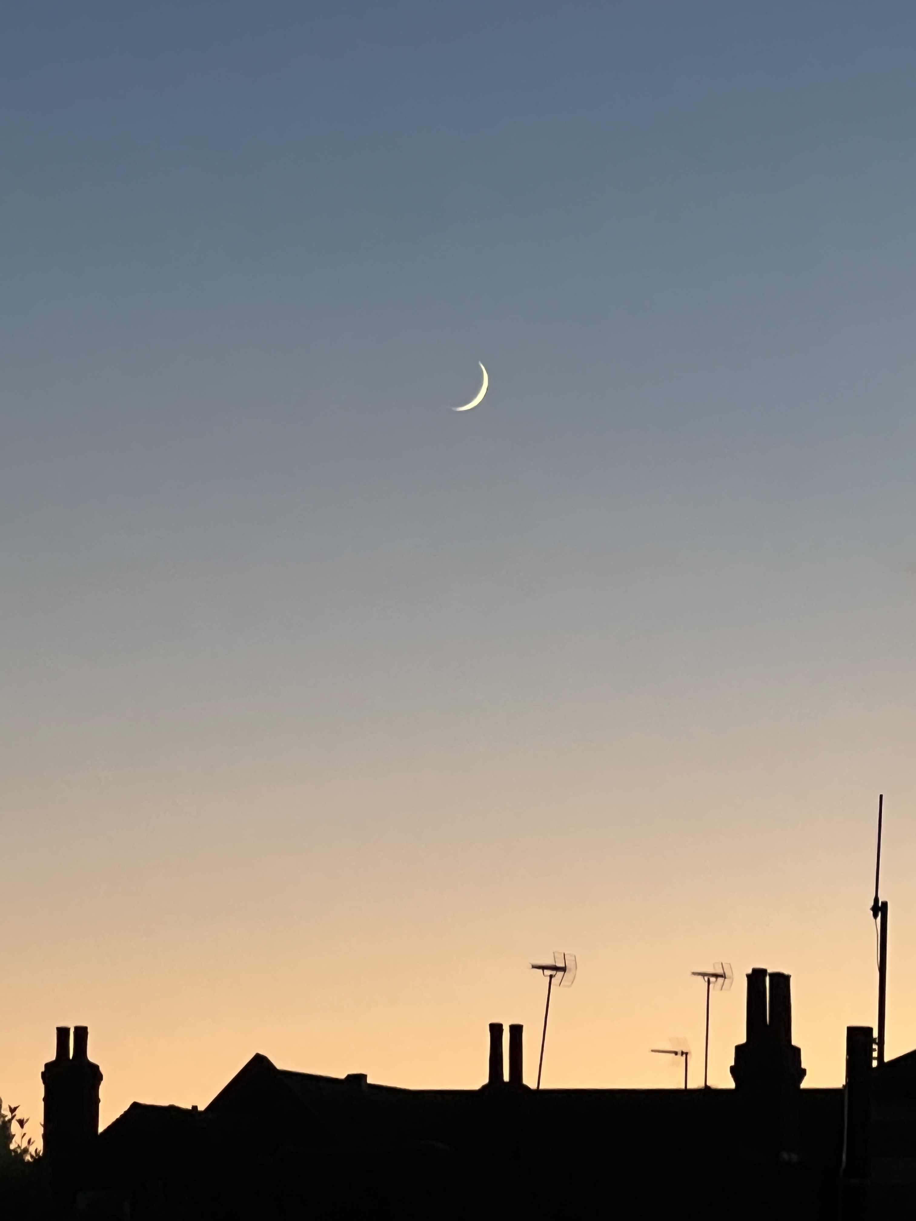 Twilight captured over a rooftop